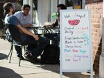 Cafe-Sign-Patrons-Hmpg